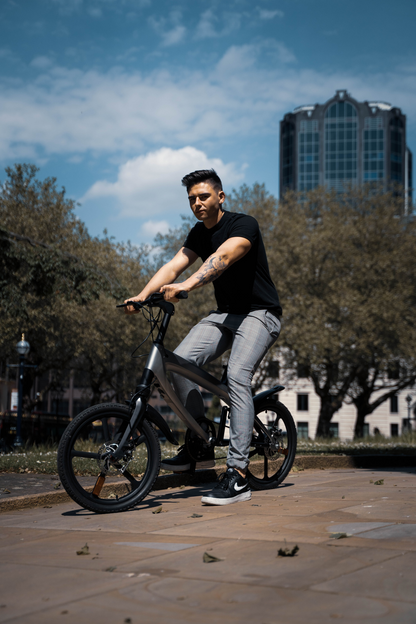 Official Carbon Black E-Bike with Built-in Speakers & Bluetooth (Range up to 60km)